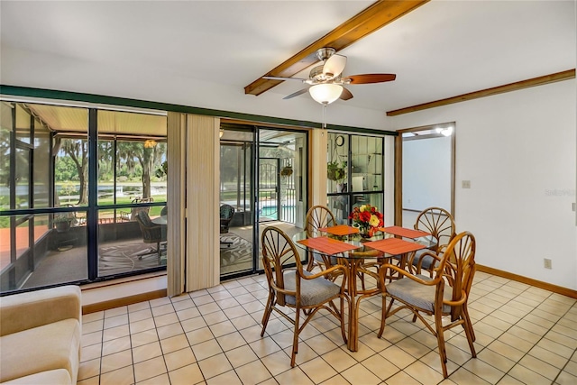 dining space with ceiling fan and light tile patterned floors