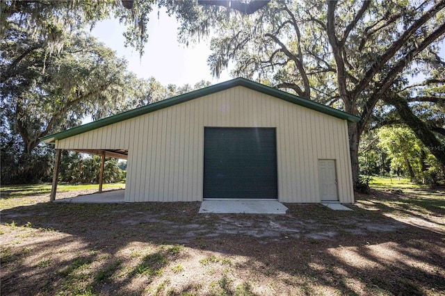 view of outbuilding with a garage