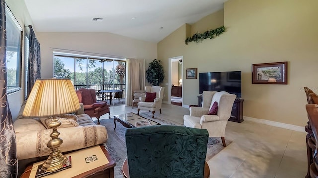 living room featuring lofted ceiling