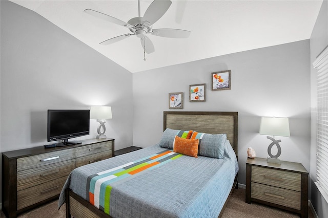 bedroom featuring dark colored carpet, ceiling fan, and lofted ceiling