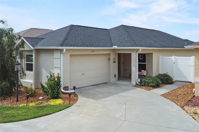 single story home with a garage