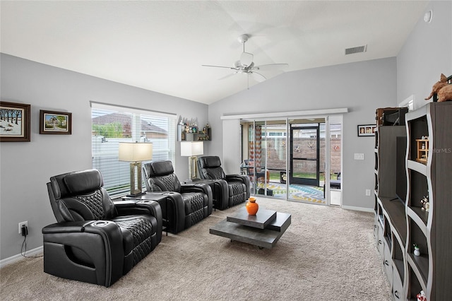 living room with light colored carpet, vaulted ceiling, and ceiling fan