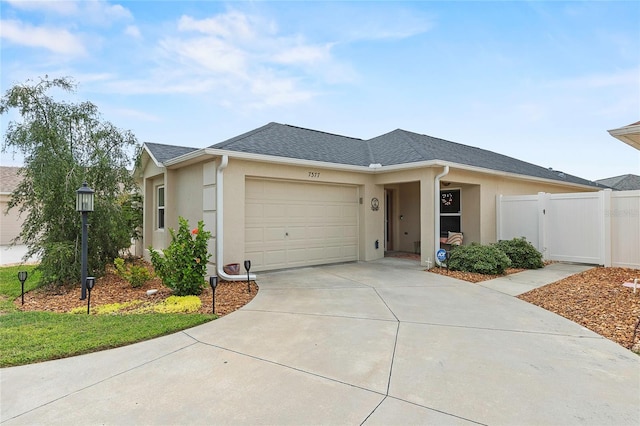 single story home with a garage