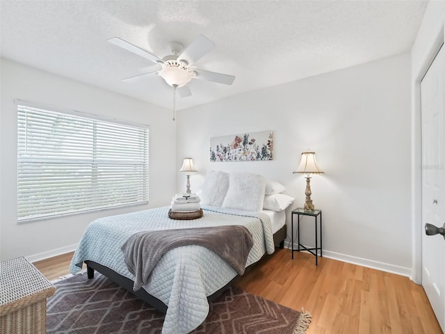 1405 W Schwartz Blvd, The Villages, FL 32159 - bedroom with a closet, light wood finished floors, and a ceiling fan