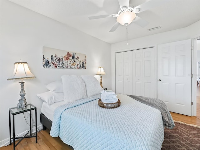 1405 W Schwartz Blvd, The Villages, FL 32159 - bedroom with wood finished floors, a closet, and a ceiling fan