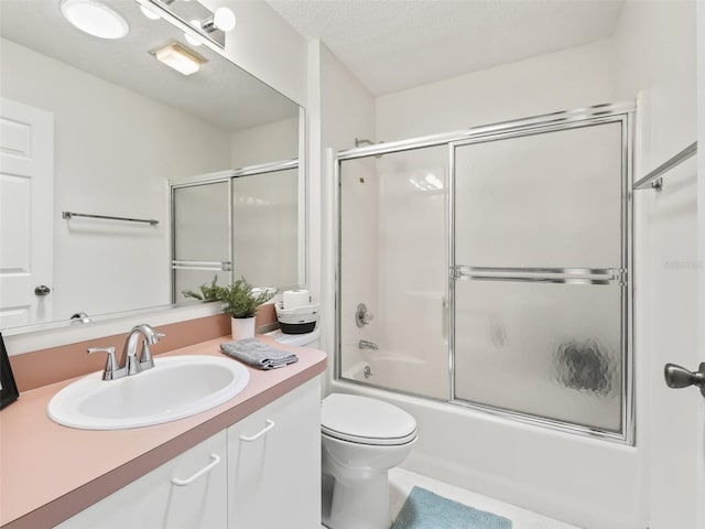1405 W Schwartz Blvd, The Villages, FL 32159 - bathroom featuring vanity, bath / shower combo with glass door, and a textured ceiling