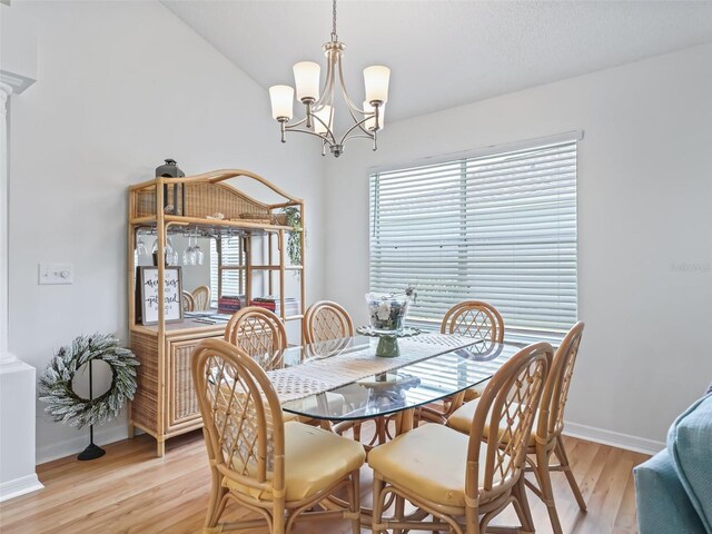 1405 W Schwartz Blvd, The Villages, FL 32159 - dining area featuring light wood-style flooring and a chandelier