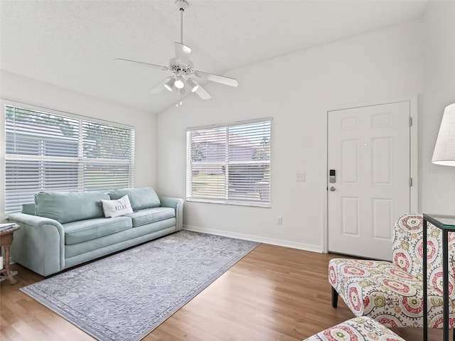1405 W Schwartz Blvd, The Villages, FL 32159 - living area with vaulted ceiling, light wood-style flooring, and ceiling fan