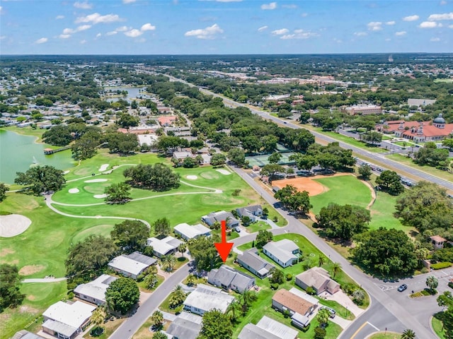 1405 W Schwartz Blvd, The Villages, FL 32159 - aerial perspective of suburban area featuring a nearby body of water and a local golf course