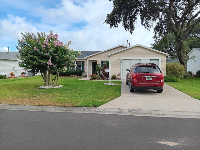 ranch-style house featuring an attached garage, driveway, and a front lawn