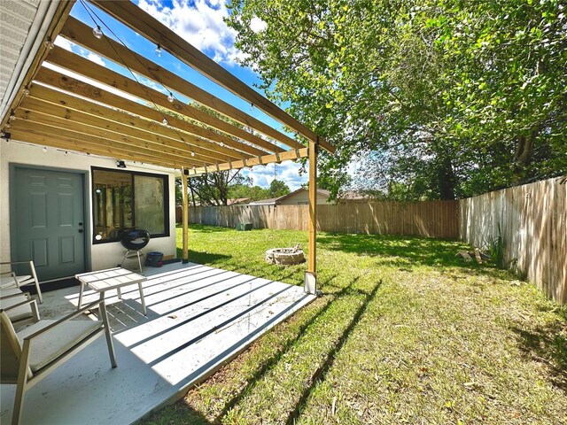 view of yard featuring a patio area and a pergola