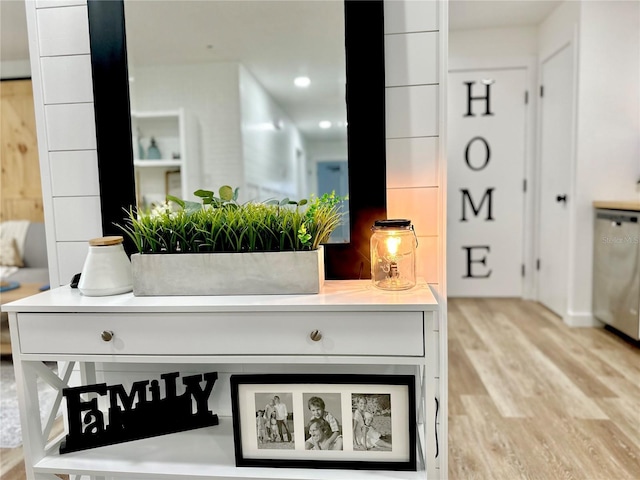 interior details with dishwasher and wood finished floors