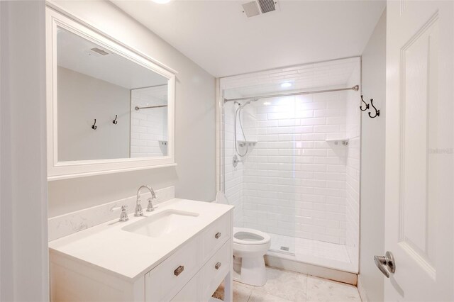 601 W Old Highway 441 Unit 11B, Mount Dora, FL 32757 - bathroom with a shower stall, toilet, vanity, and tile patterned floors