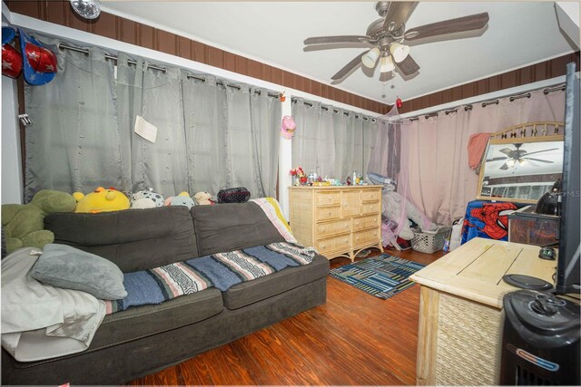 bedroom with hardwood / wood-style floors and ceiling fan