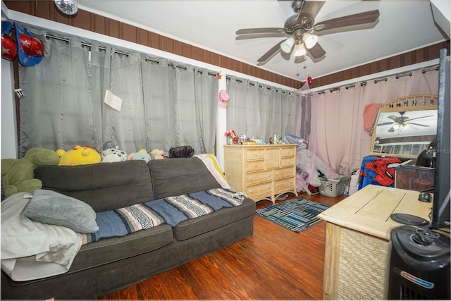 bedroom with wood-type flooring and ceiling fan