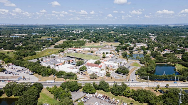 drone / aerial view with a water view