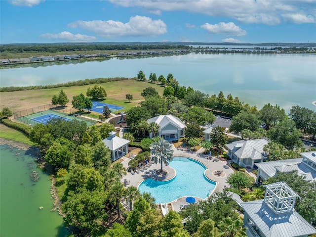 birds eye view of property with a water view