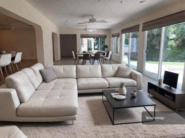 living room featuring ceiling fan