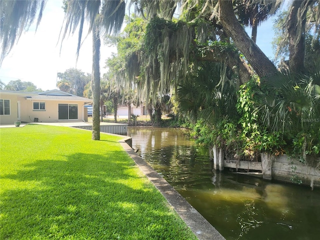 exterior space with a water view