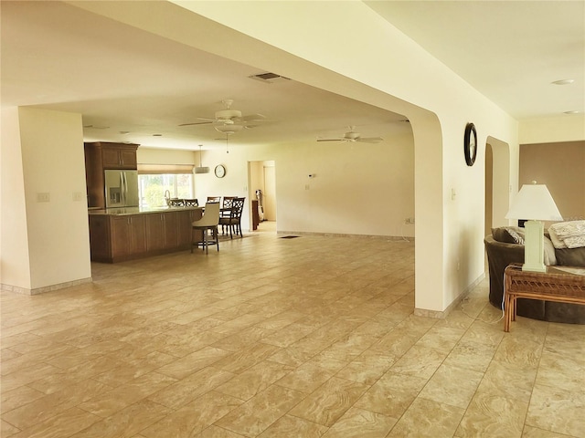 living room with ceiling fan