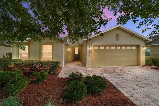 view of front of property featuring a garage