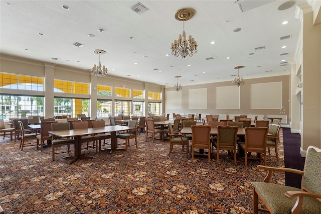 carpeted dining area featuring ornamental molding