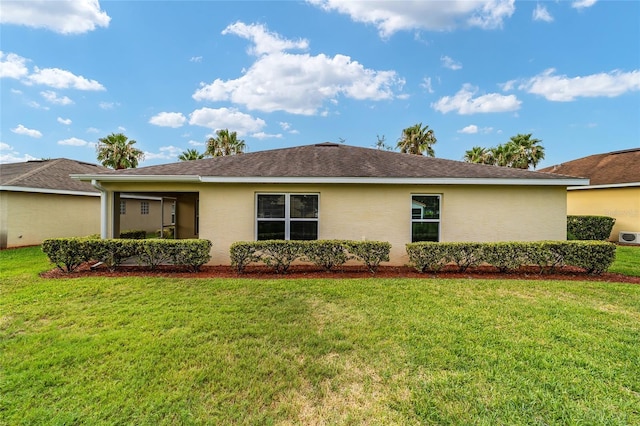 exterior space with a lawn