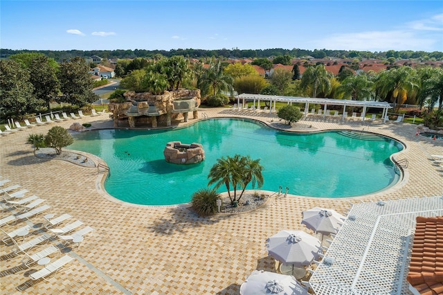 view of swimming pool featuring a patio