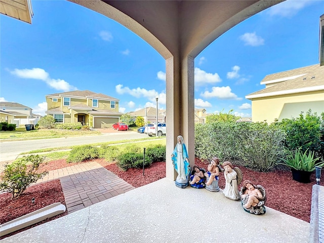 view of patio featuring a garage