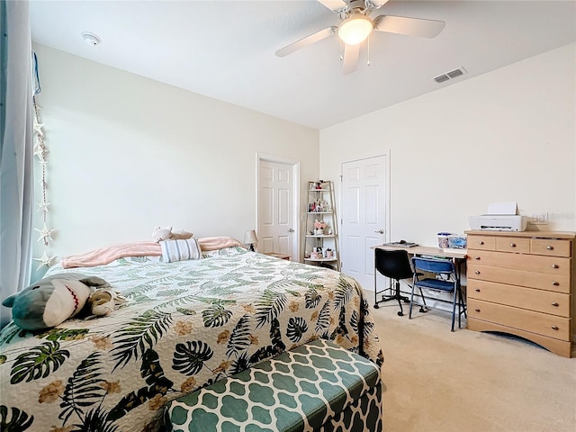 carpeted bedroom featuring ceiling fan