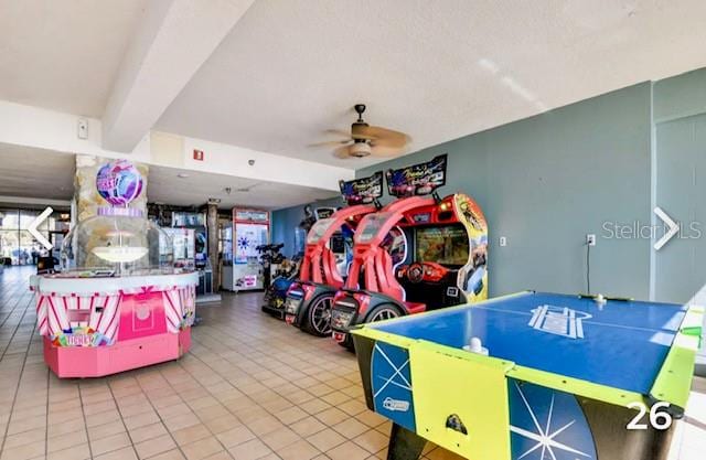 playroom featuring tile patterned flooring and ceiling fan