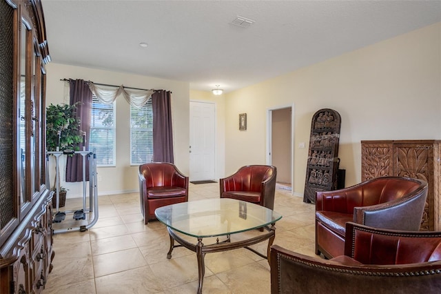 sitting room featuring light tile patterned floors