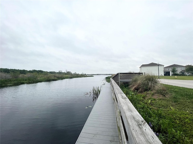 dock area featuring a water view