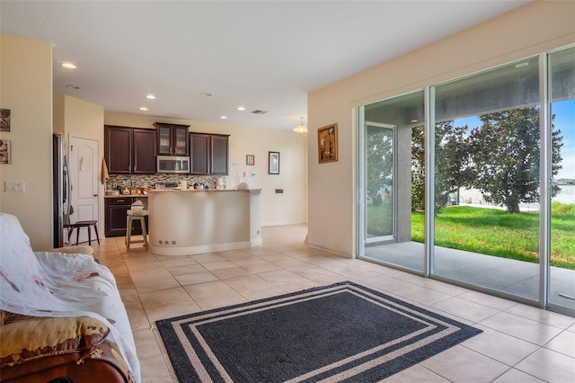 living room featuring light tile patterned floors