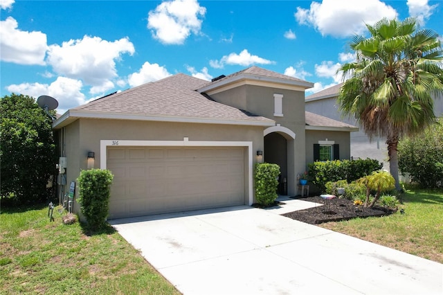 view of front of property featuring an attached garage, a shingled roof, concrete driveway, and stucco siding