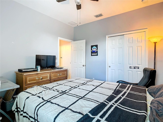 bedroom featuring ceiling fan and a closet