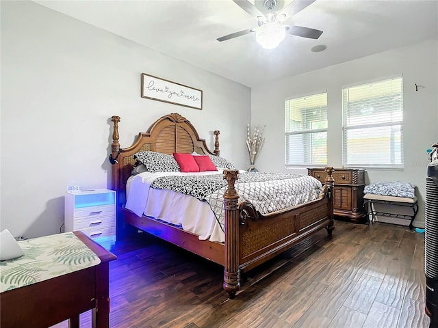 bedroom featuring dark hardwood / wood-style floors and ceiling fan