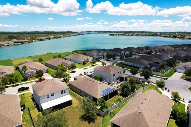 drone / aerial view with a water view