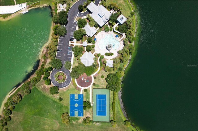 birds eye view of property featuring a water view