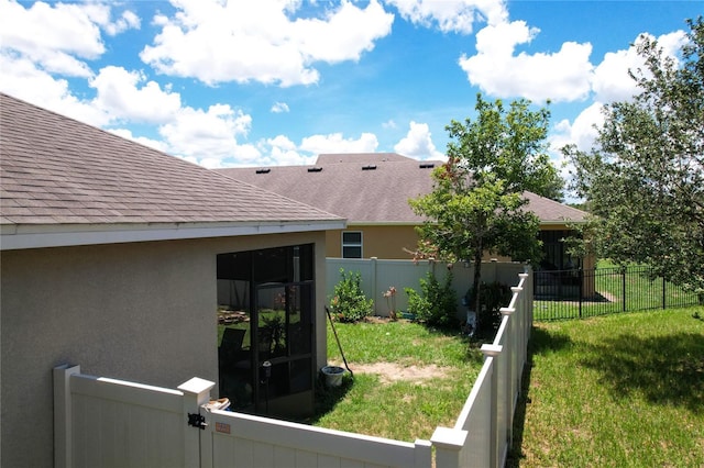 view of yard featuring a fenced backyard