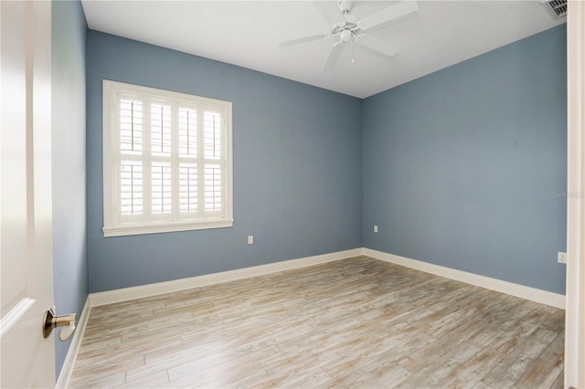 unfurnished room with ceiling fan and light hardwood / wood-style floors