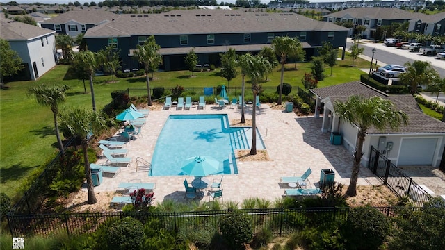 view of swimming pool featuring a patio area