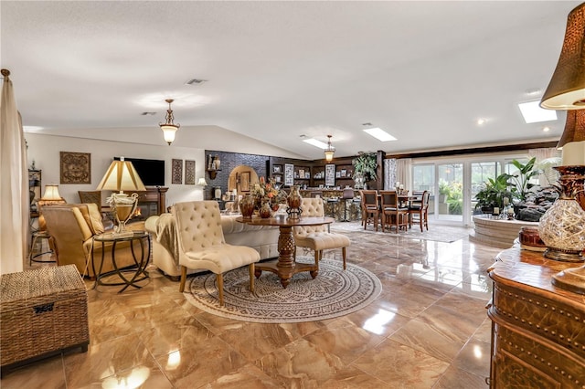 living room with vaulted ceiling