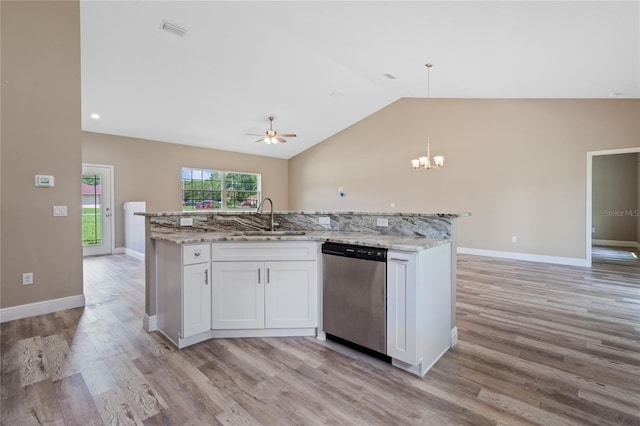 kitchen featuring sink, hanging light fixtures, white cabinetry, light wood-type flooring, and dishwasher