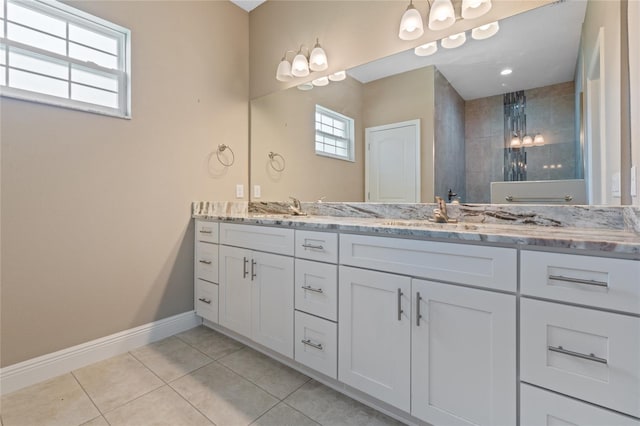 bathroom featuring dual vanity and tile patterned flooring