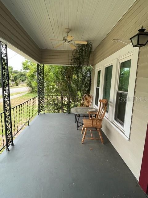 view of patio / terrace with a porch and ceiling fan