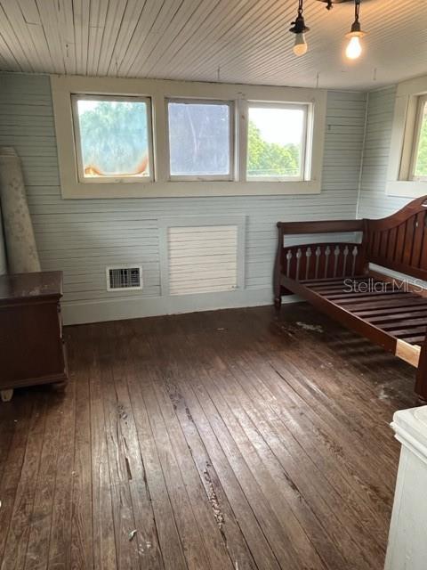 bedroom featuring dark hardwood / wood-style floors