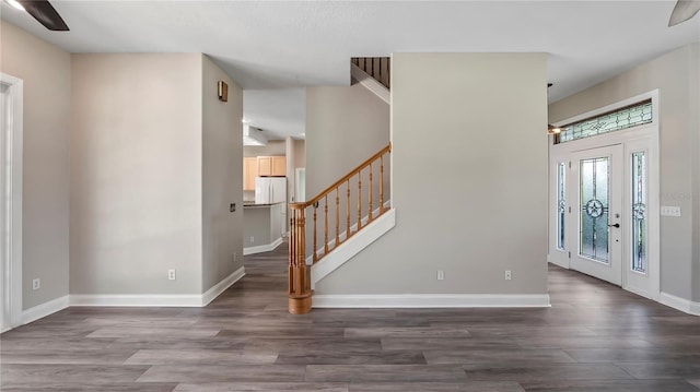 foyer with dark wood-type flooring