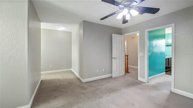 unfurnished bedroom featuring ceiling fan