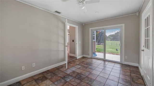 doorway featuring ceiling fan and ornamental molding